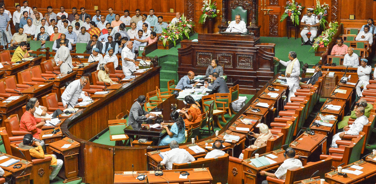 Ministers and MLAs during the Monsoon Session of Karnataka Assembly. Credits: PTI Photo