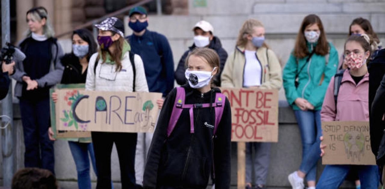 Swedish climate change activist Greta Thunberg protests in front of the Swedish Parliament in Stockholm, Sweden. Credit: Reuters Photo