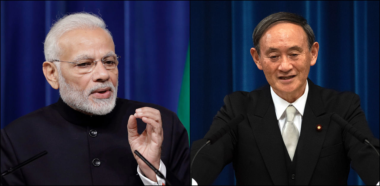 Prime Minister Narendra Modi and his new counterpart in Japan, Yoshihide Suga. Credit: AP/PTI Photos