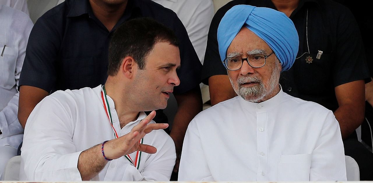 Former prime minister Manmohan Singh, Congress leader Rahul Gandhi. Credit: Reuters Photo
