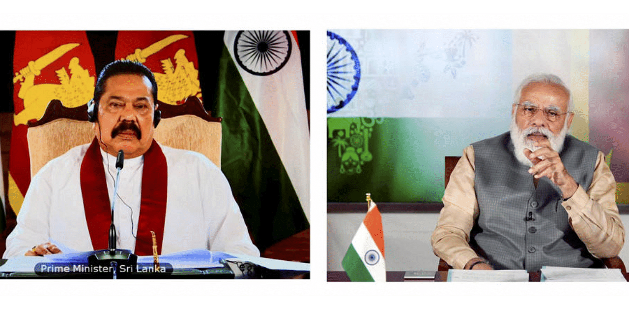Prime Minister Narendra Modi and Sri Lankan PM Rajapaksa review the broad framework of the bilateral relationship during India-Sri Lanka Virtual Bilateral Summit, in New Delhi. Credit: PTI Photo