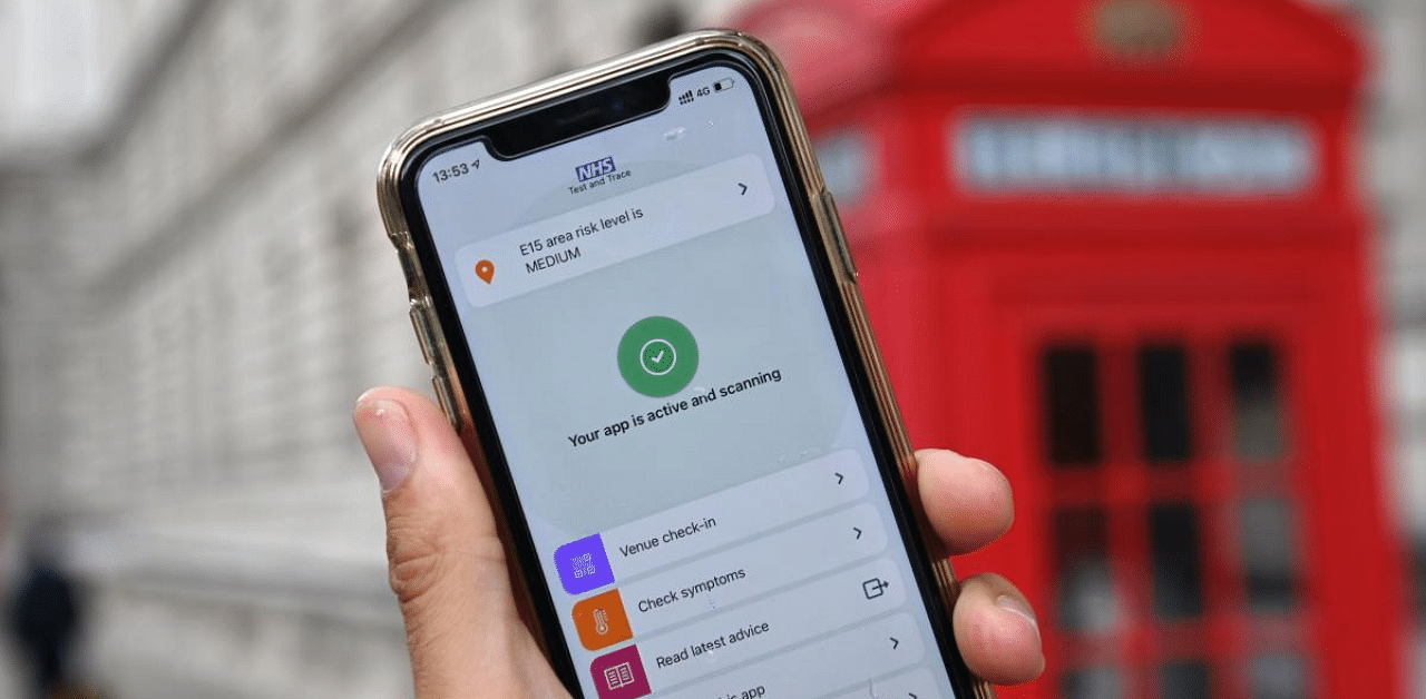 The NHS Covid-19 app was launched this week, four months later than expected. It uses Bluetooth signals to log when a user is in close contact with another user, generally meaning within two metres for 15 minutes or more. Credit: AFP Photo