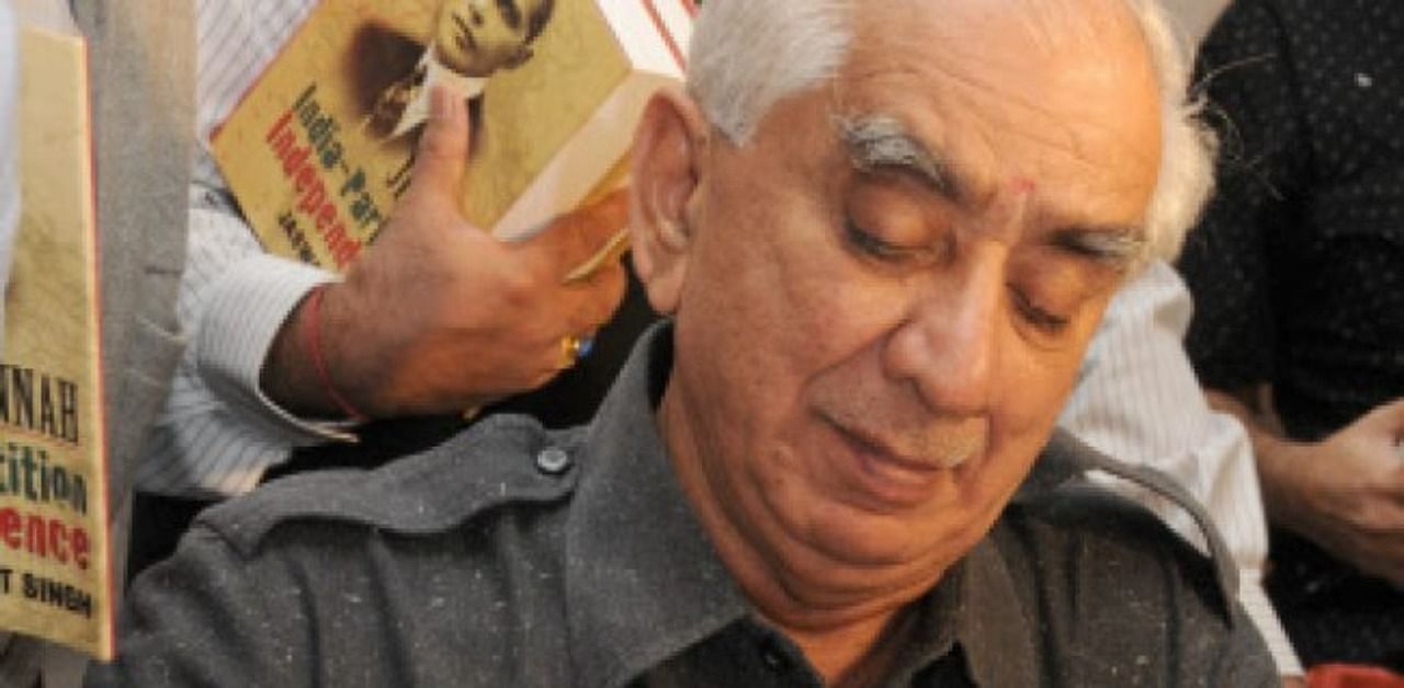 Former Union Minister Jaswant Singh signing his book, Jinnah: India-Partition Independence book, at the book launch programme in Bengaluru. Credit: DH Archive