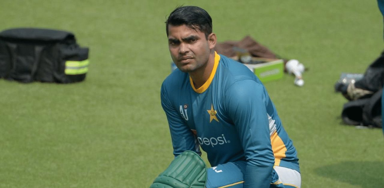 Earlier this year, Akmal was banned by the PCB for three years for failing to report corrupt approaches, following which its own independent adjudicator reduced the suspension period to 18 months. Credit: AFP Photo