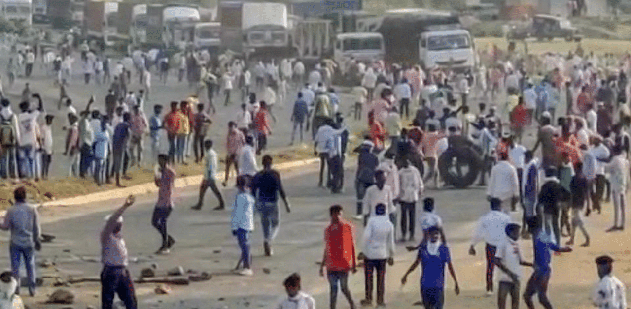 Protestors block a highway during a protest demanding recruitment of reserved category candidates on vacant unreserved positions for teachers from the year 2018, in Kakari Dungri village of Dungarpur district, Friday, Sept.25, 2020. Credit: PTI Photo