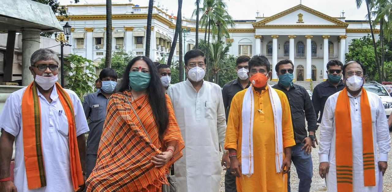BJP Mahila Morcha President Agnimitra Paul (2nd L), party State Vice President Jay Prakash Majumder (R), party state secretary & MLA Sabyasachi Dutta (C), party's Kisan Morcha State President Mahadev Sarkar (2nd R) and others leave after a meeting with West Bengal Governor Jagdeep Dhankhar, at Raj Bhavan in Kolkata. Credit: PTI