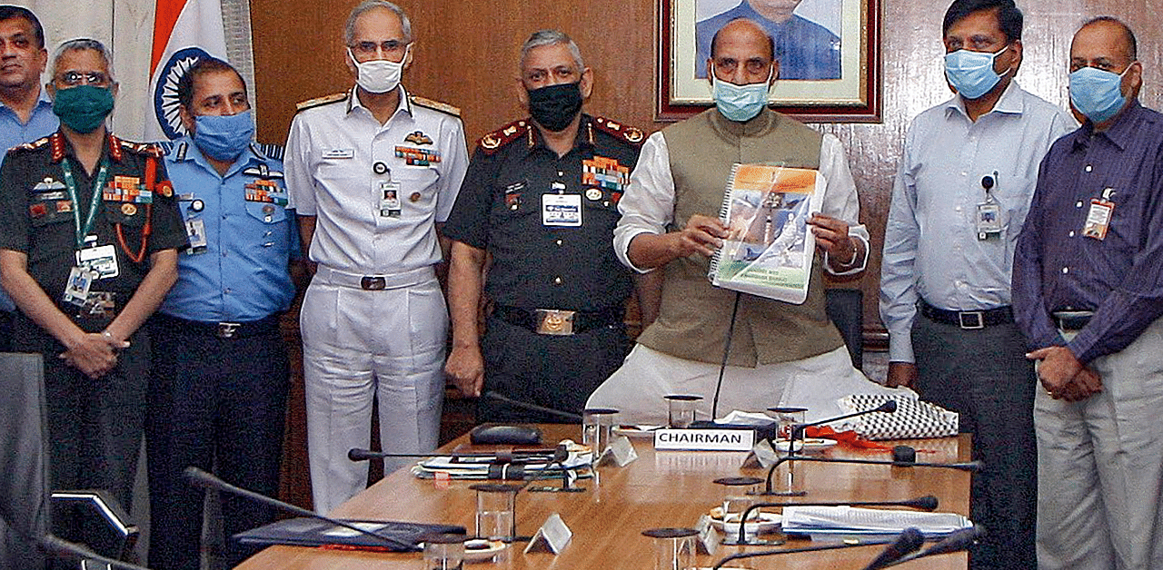 Defence Minister Rajnath Singh releases the New Defence Acquisition Procedure (DAP) at the Defence Acquisition Council (DAC) meeting. Credits: PTI Photo
