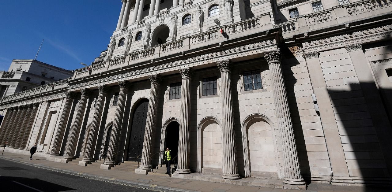 A security officer stands outside the Bank of England. Credit: Reuters Photo