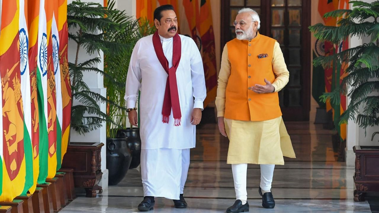 Prime Minister Narendra Modi and the Sri Lankan Prime Minister Mahinda Rajapaksa at Hyderabad House, in New Delhi. Credit: PTI