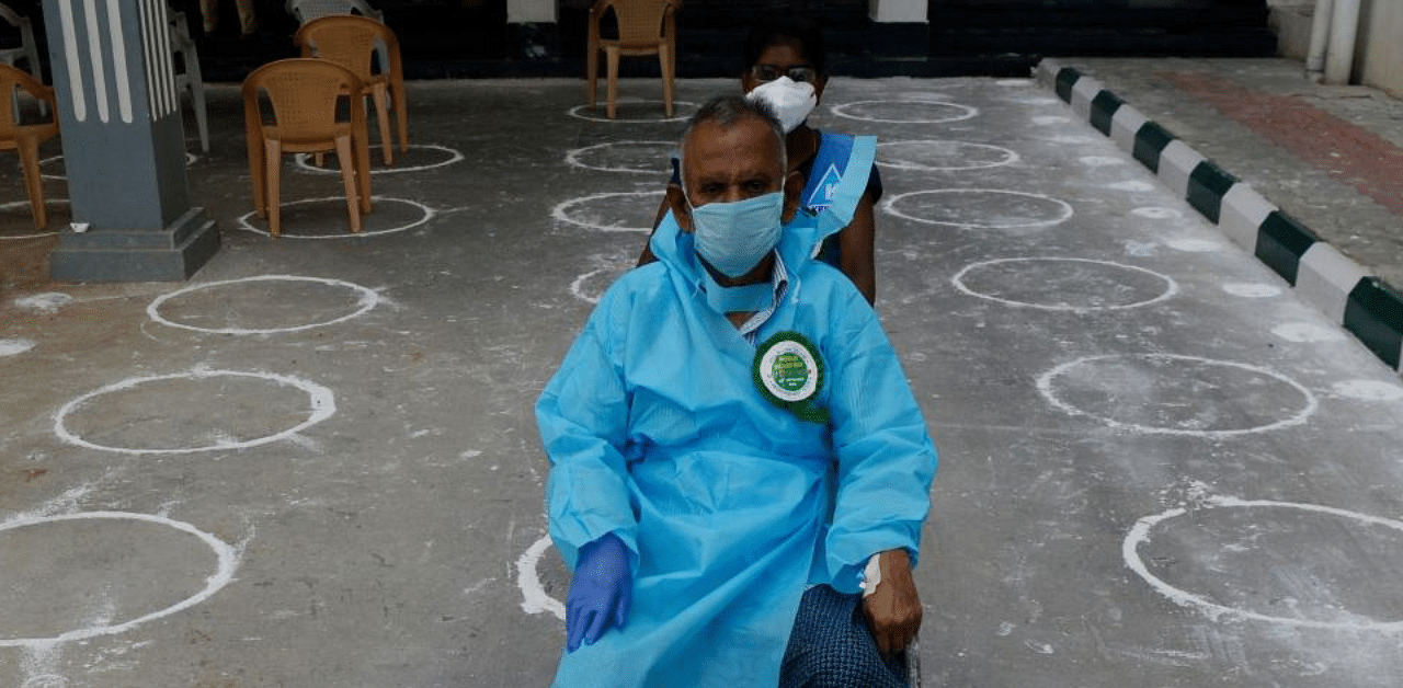 A man with a heart condition, who recovered from the Covid-19 coronavirus, prepares to go home during World Heart day celebrations at a government hospital in Chennai on September 29, 2020. Credit: AFP Photo