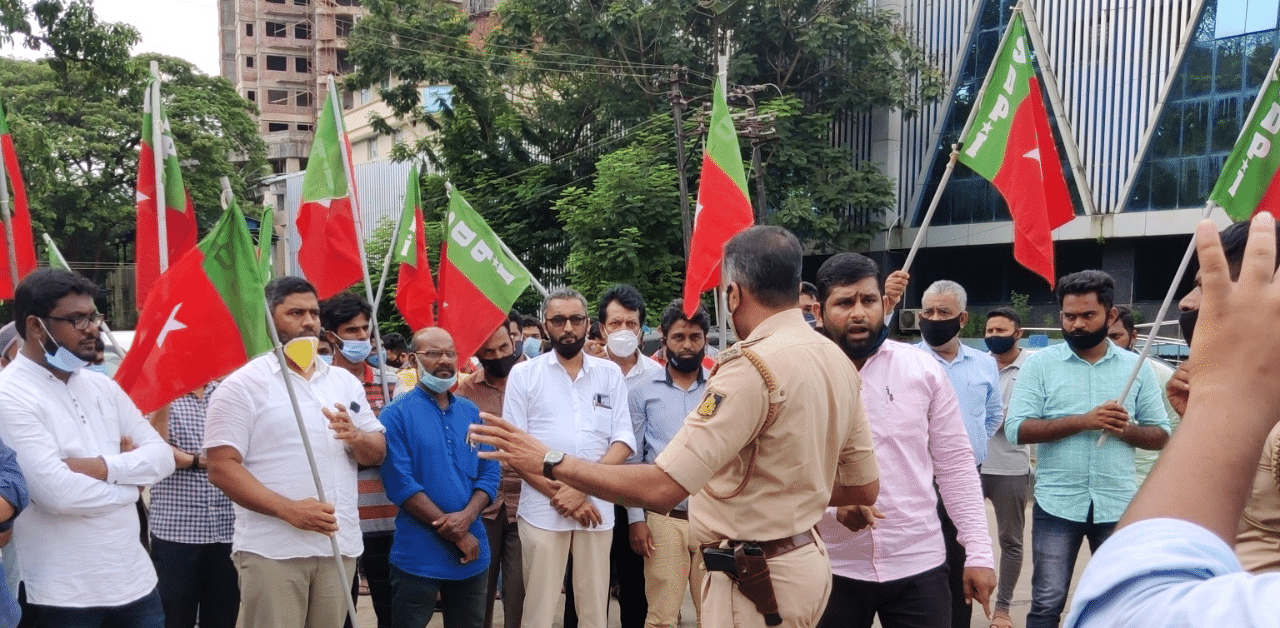 SDPI activists stage a protest in front of the DC's office in Mangaluru on Wednesday.  Credit: DH Photo