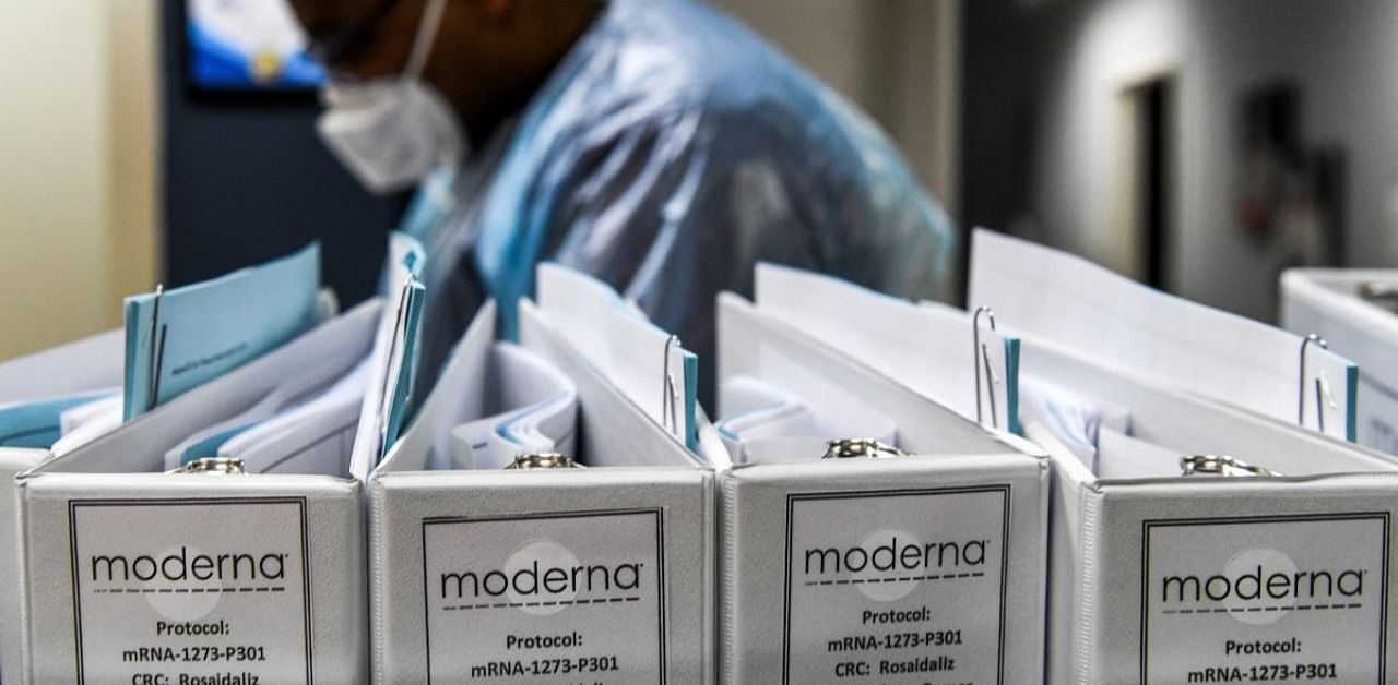 Moderna is already testing the higher dose in a large Phase III trial, the final stage before seeking emergency authorization or approval. Credit: AFP