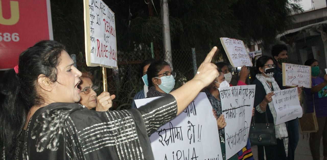 All India Progressive Women's Association (AIPWA) activists stage a protest over the death of Hathras gangrape victim. Credit: PTI Photo