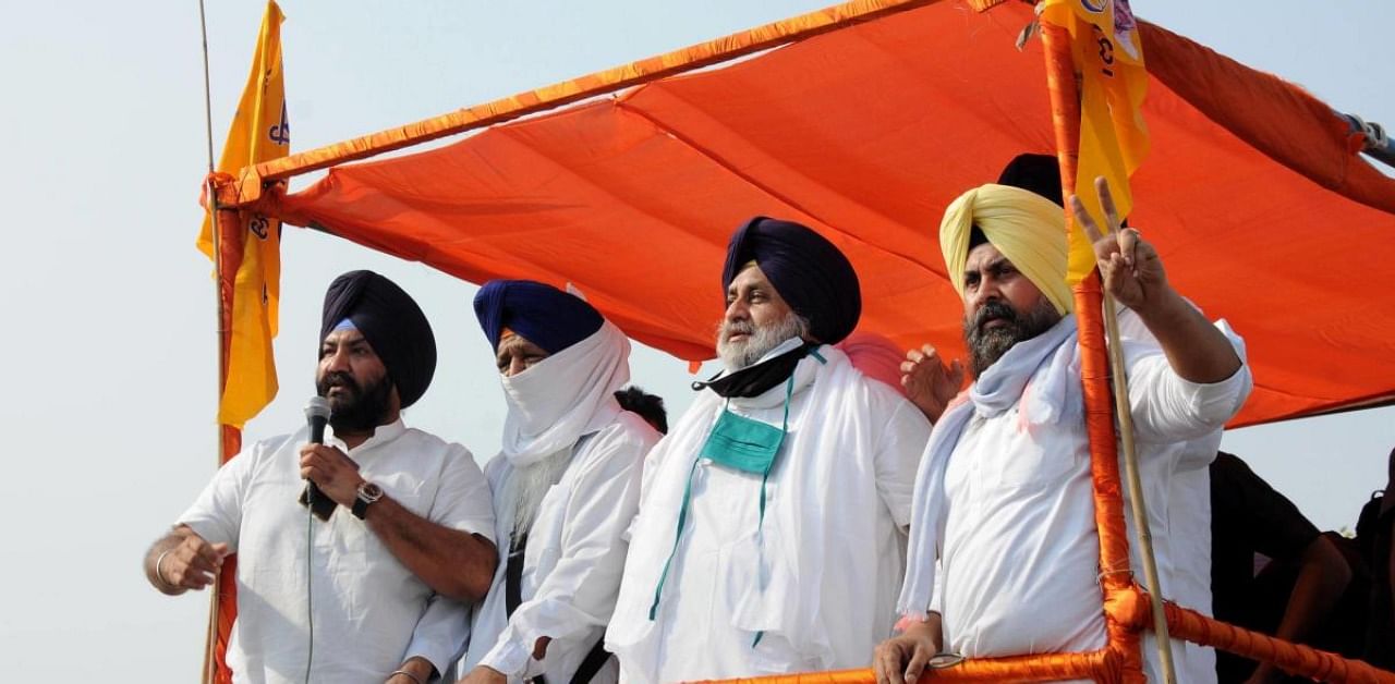 Shiromani Akali Dal President Sukhbir Singh Badal with former Punjab minister Bikram Singh Majithia and party leaders and workers during a protest march against the recent farm laws, in Amritsar. Credit: PTI