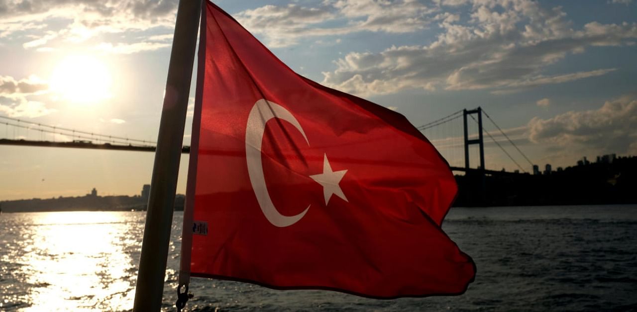 A Turkish flag flies on a passenger ferry in Istanbul, Turkey. Credit: Reuters