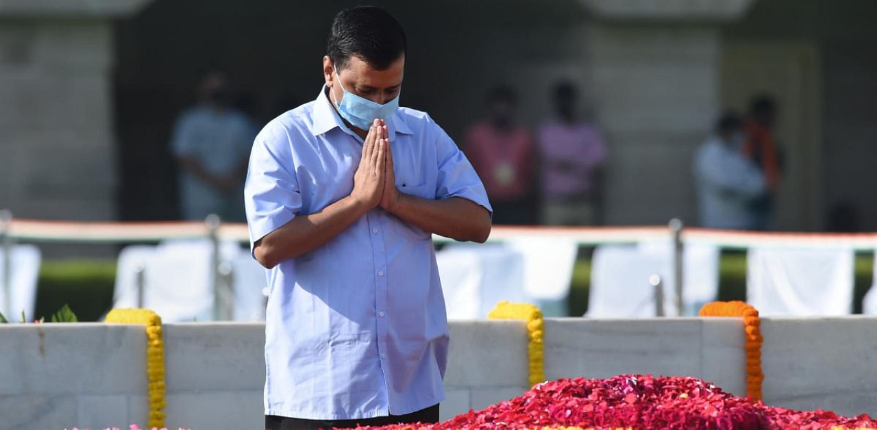 Delhi Chief Minister Arvind Kejriwal pays homage to Mahatma Gandhi on the occasion of his 151st birth anniversary, at Rajghat in New Delhi. Credit: PTI