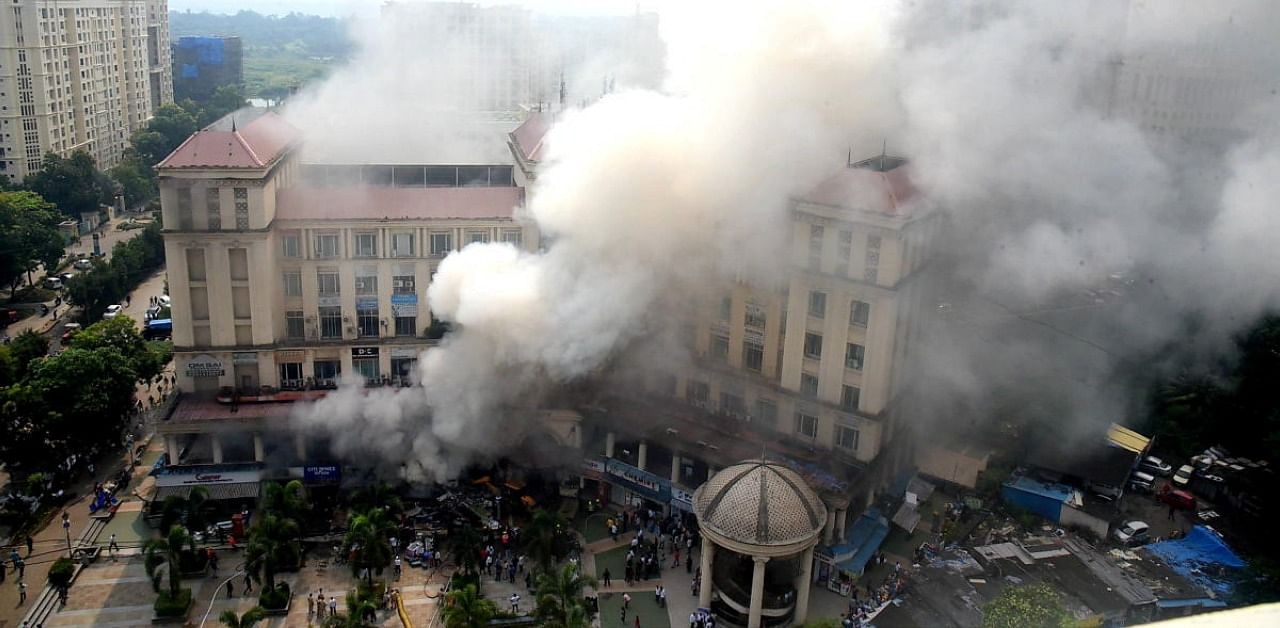 Smoke billows from fire that broke out in a shopping centre, in Thane. Credit: PTI