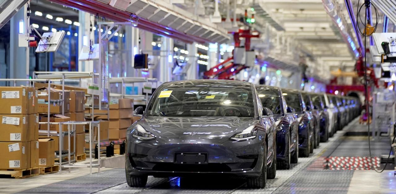 Tesla vehicles are seen during a delivery event. Credit: Reuters