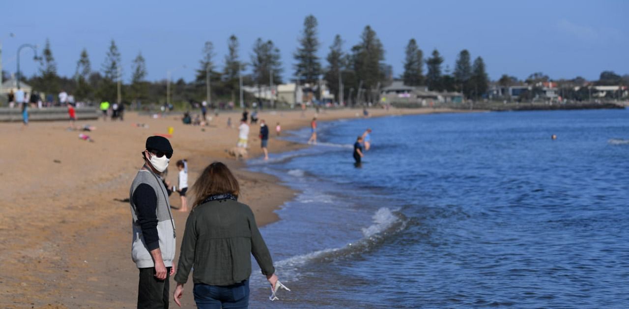 Hundreds of people in the city of Melbourne breached stringent lockdown restrictions and flocked to beaches on the warmest weekend in months. Credit: Reuters