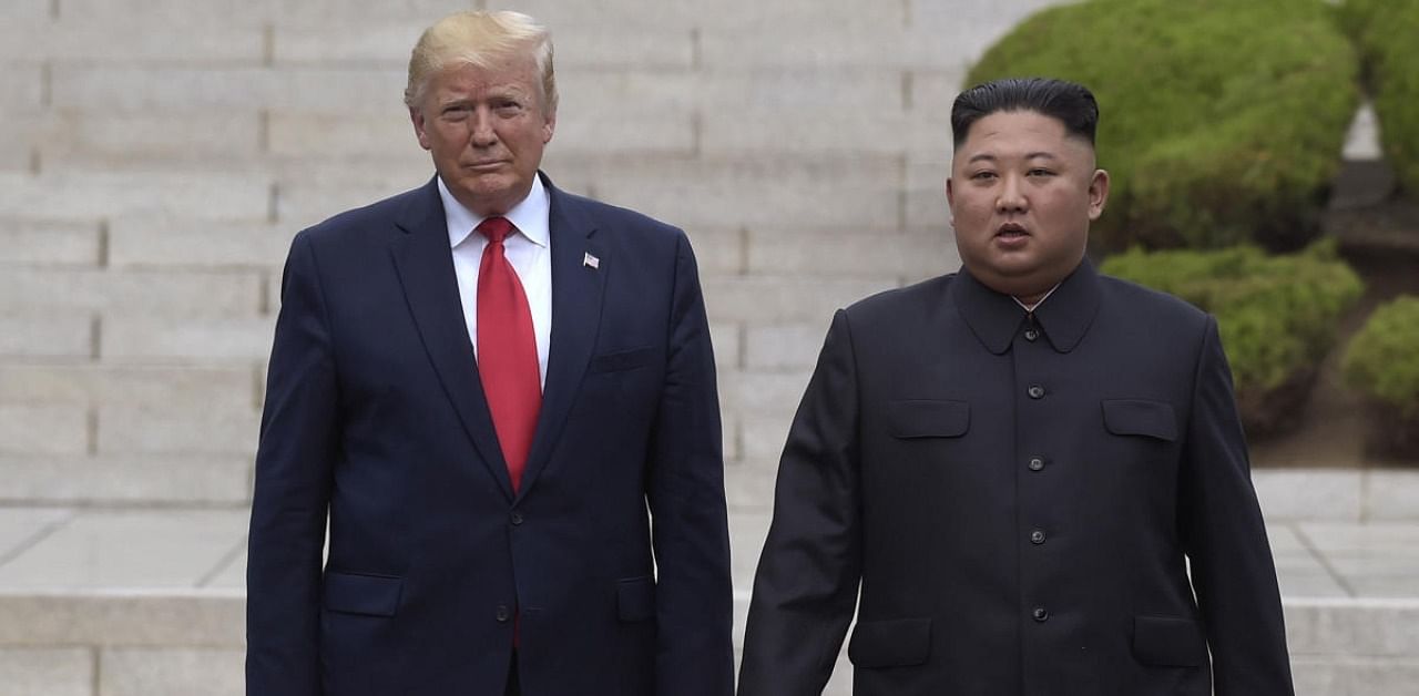 US President Donald Trump with North Korean leader Kim Jong Un. Credit: AP/PTI