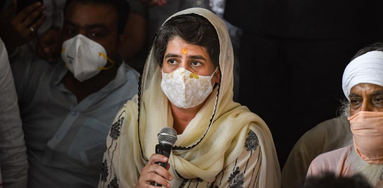 Congress General Secretary Priyanka Gandhi Vadra speaks during a prayer meet of the Hathras victim. Credit: PTI