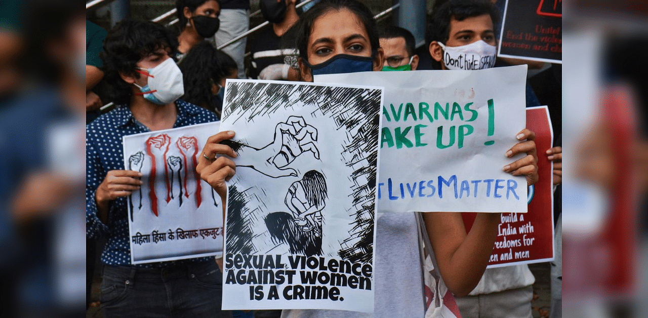 Democratic Youth Federation of India (DYFI) members during a protest rally demanding justice for the Hathras victim, outside the gate of IIT Powai, in Mumbai, Friday, Oct. 2, 2020. Credit: PTI Photo