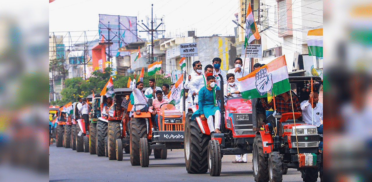 Congress party workers during a protest over the farm reform bills passed in Parliament, at Gandhi Chowk in Latur, Friday, Oct. 2, 2020. Credit: PTI Photo