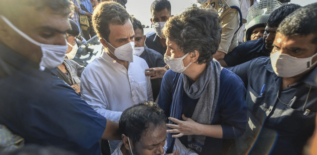 Congress leaders Rahul Gandhi and Priyanka Gandhi at Delhi-Noida border as they attempt to move towards Hathras to meet family members of the 19-year-old woman who died after she was allegedly gang-raped, in New Delhi. Credit: PTI Photo