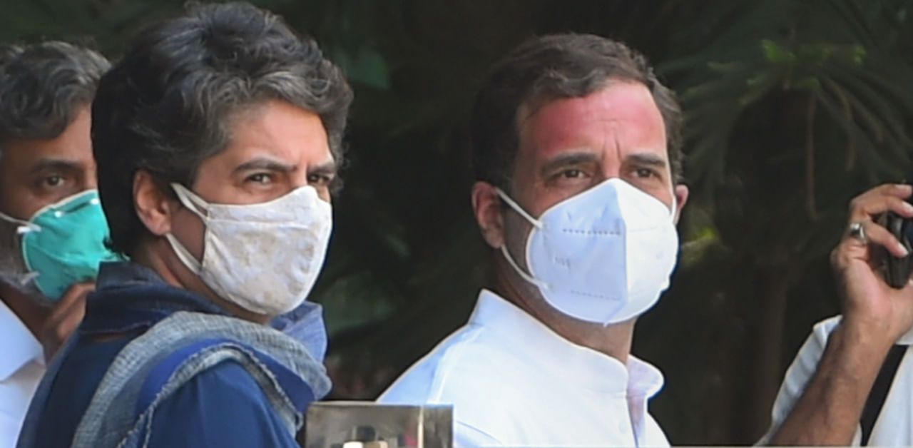   New Delhi: Congress leaders Rahul Gandhi and Priyanka Gandhi Vadra before leaving for Hathras to meet the family members of a 19-year-old Dalit woman who died after allegedly being gang-raped two weeks ago, in New Delhi, Saturday, Oct. 3, 2020. Credit: PTI Photo