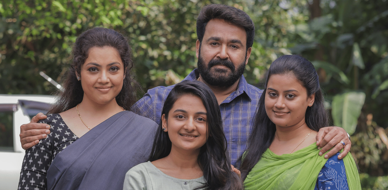 Mohanlal with his 'Drishyam 2' family. Credit: @Mohanlal