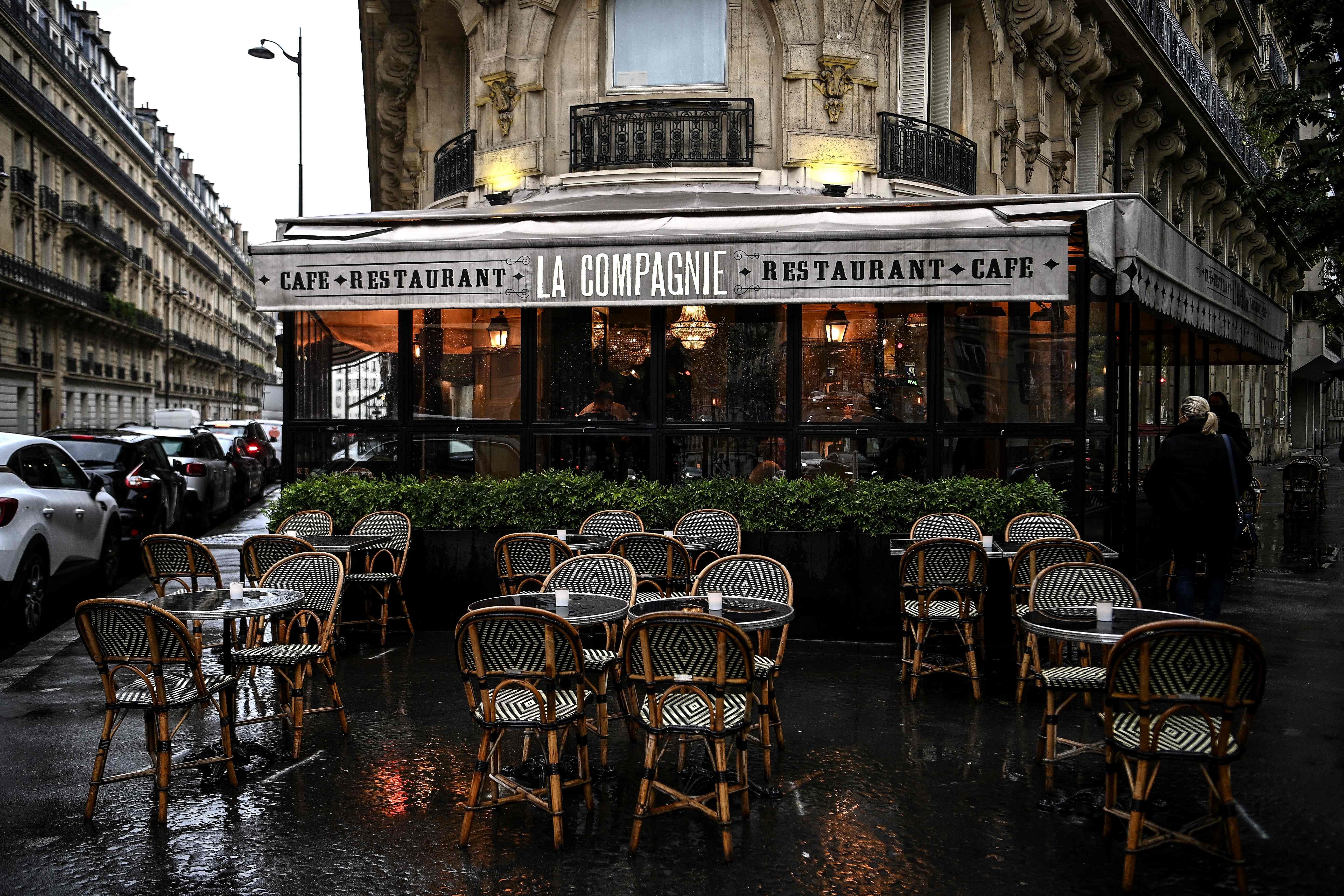 Image shows distanced tables on a terrasse of a restaurant in Paris, amid new measures to fight the rapid spread of Covid-19. Credit: AFP Photo