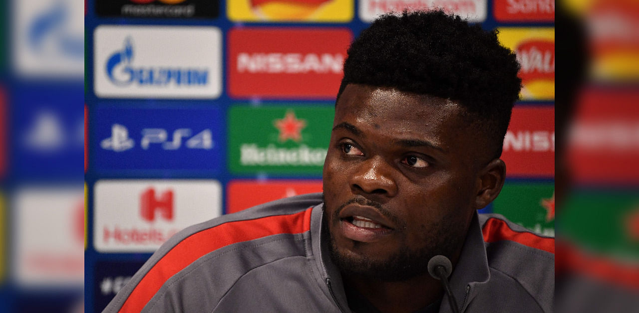  In this file photo taken on March 10, 2020 Atletico Madrid's Ghanaian midfielder Thomas Partey attends a press conference at Anfield stadium in Liverpool. Credit: AFP Photo