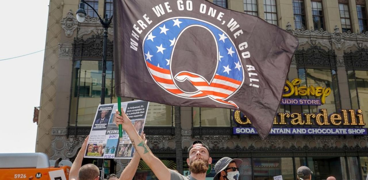 The QAnon conspiracy movement has exploded from the US political fringe into the global mainstream during the COVID-19 coronavirus pandemic, with its influence seen at anti-lockdown and anti-mask rallies from Los Angeles, to London and Melbourne. Credit: AFP