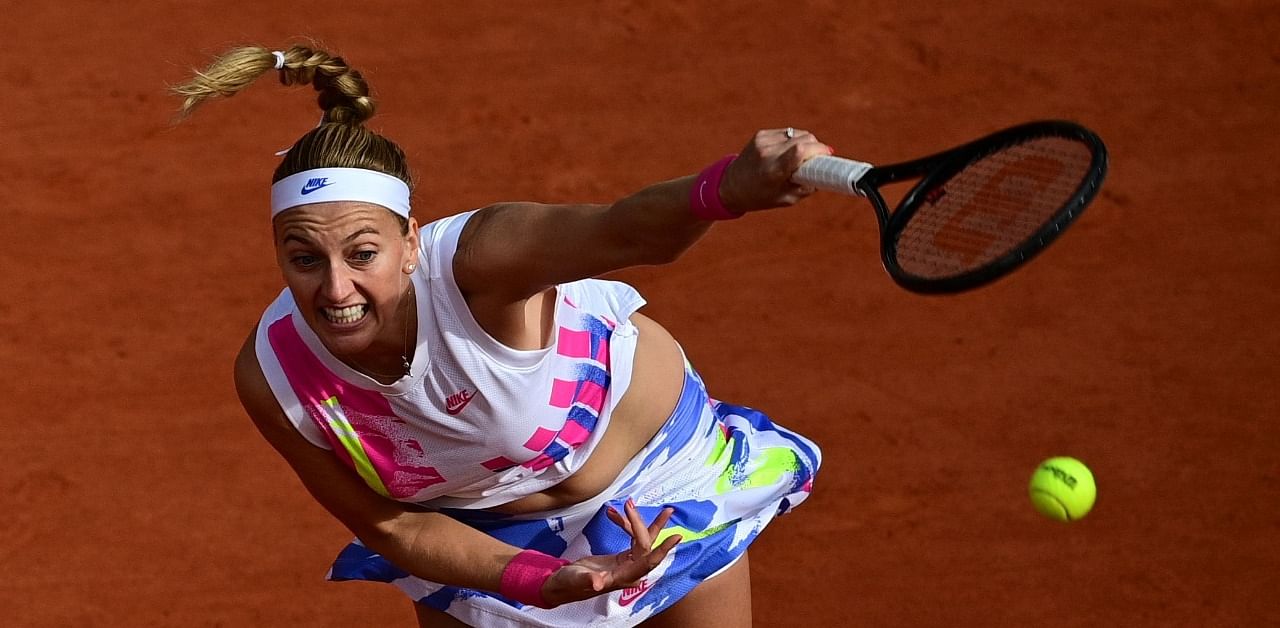 Czech Republic's Petra Kvitova serves the ball to Germany's Laura Siegemund during their women's singles quarter-final tennis match. Credit: AFP Photo