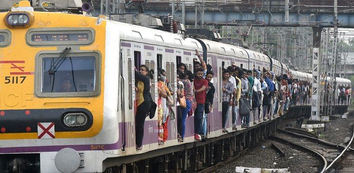 Dabbawalas, the famous lunch-box carriers in Mumbai, last month said there was never a six-month break in the "130-year-old history of the tiffin services", and demanded access to local trains to resume their services in full capacity. Credit: AFP Photo