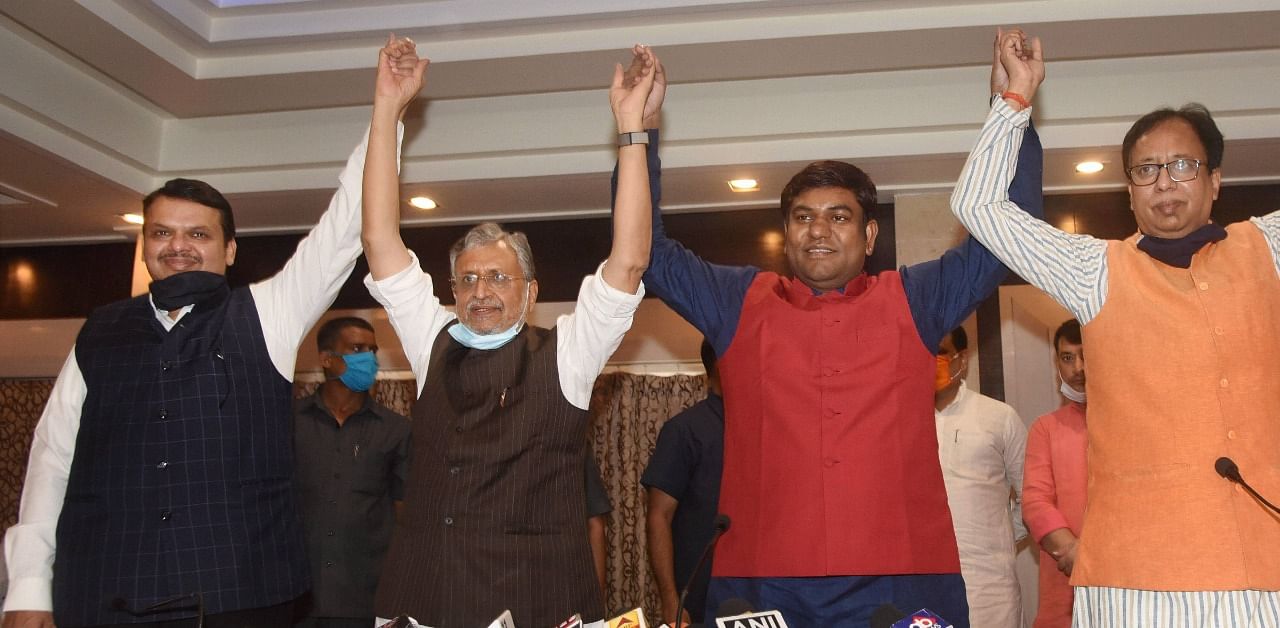 Former Maharashtra chief minister and Bihar BJP election in-charge Devendra Fadnavis (L), Deputy CM Sushil Kumar Modi (2L), state president Sanjay Jashwal with Vikassheel Insaan Party (VIP) leader Mukesh Sahani. Credit: PTI Photo