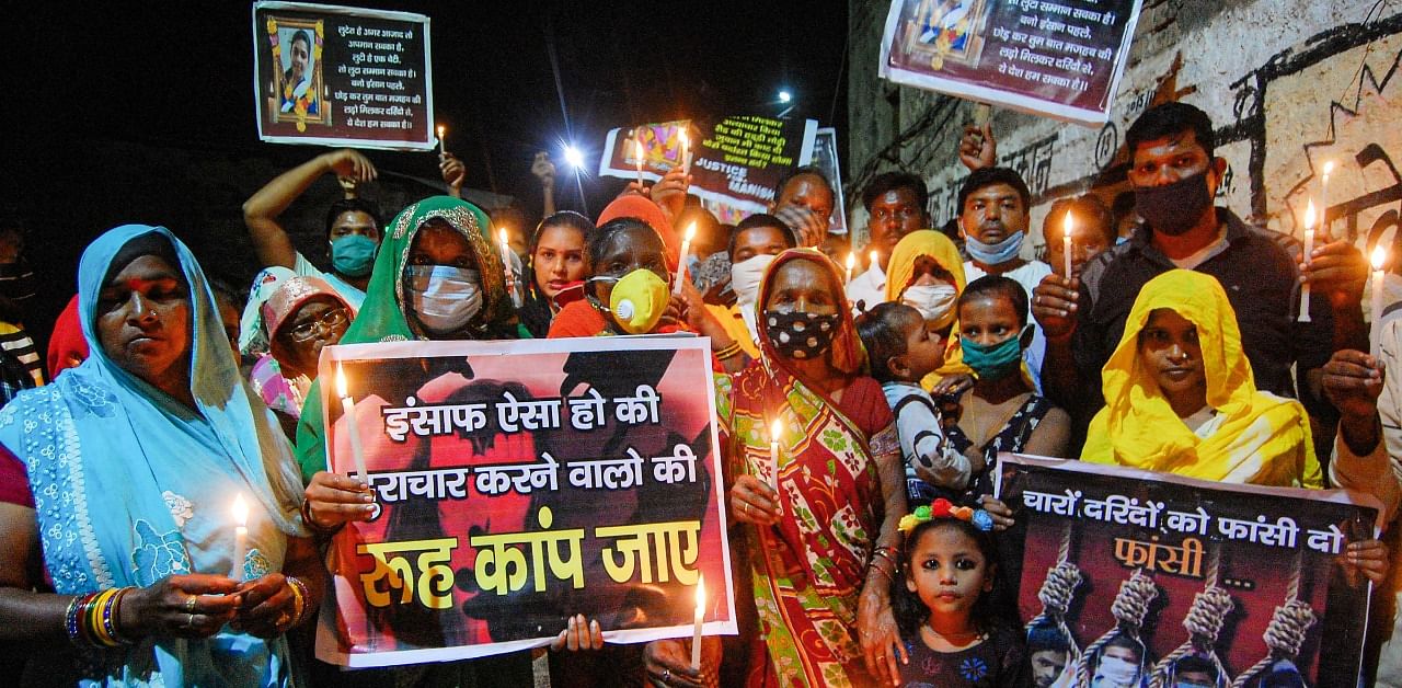 Members of Valmiki community during a protest against the death of a 19-year-old Dalit woman who was allegedly gang-raped in Hathras. Credit: PTI Photo