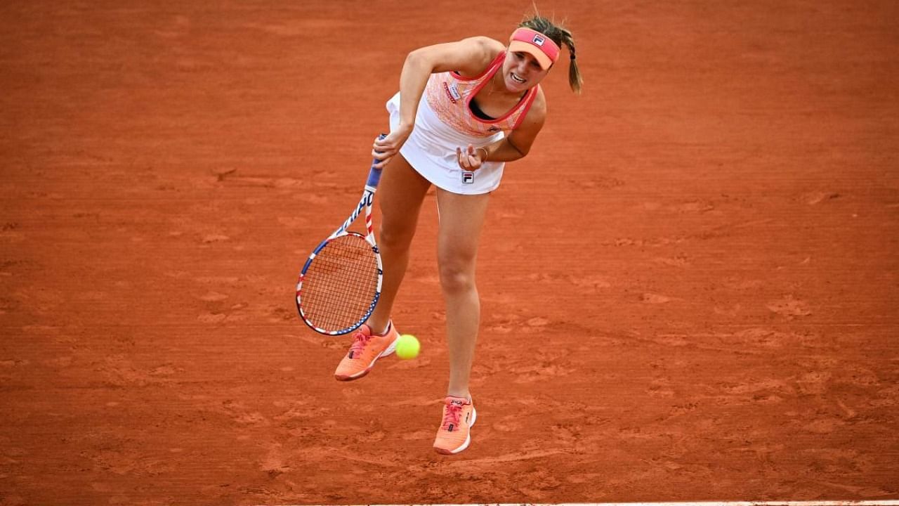 Sofia Kenin of the US serves ball to Czech Republic's Petra Kvitova during their women's singles semi-final tennis match on Day 12 of The Roland Garros 2020 French Open tennis tournament in Paris. Credit: AFP.