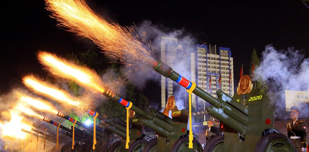 A gun salute is fired during a parade to mark the 75th anniversary of the founding of the ruling Workers' Party of Korea. Credit: Reuters Photo
