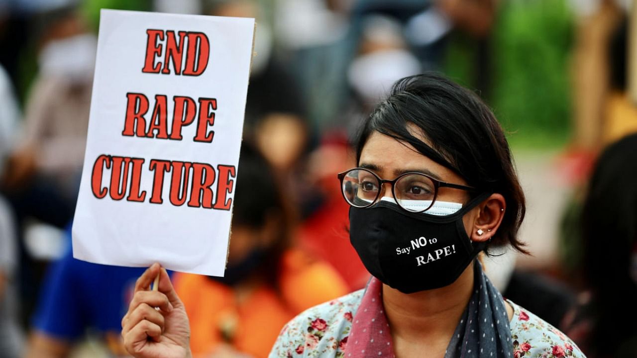 Members of a feminist group take part in an ongoing protest demanding justice for the alleged gang rape of a woman, in Dhaka. Credit: Reuters.