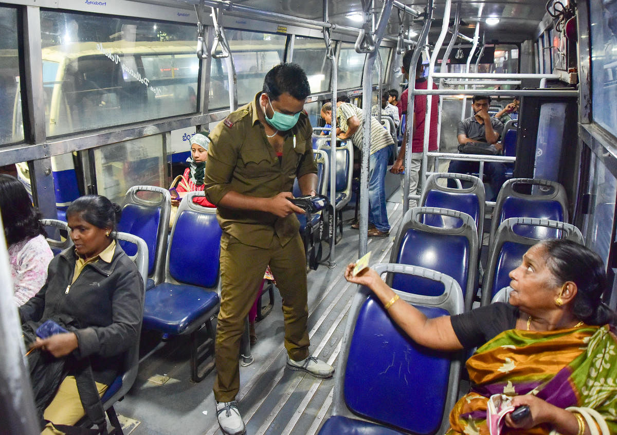 BMTC bus conductors run the risk of contracting the infection as they deal with hundreds of passengers daily. DH FILE PHOTO