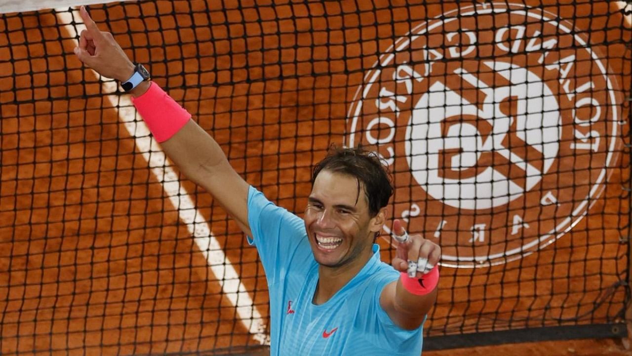Spain's Rafael Nadal celebrates after winning against Serbia's Novak Djokovic at the end of their men's final tennis match at the Philippe Chatrier court on Day 15 of The Roland Garros 2020 French Open tennis tournament in Paris. Credit: AFP.