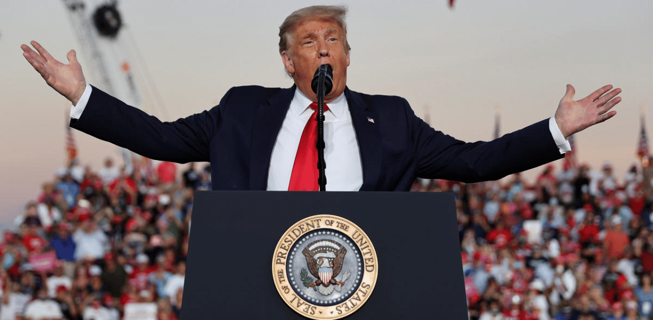 US President Donald Trump speaks during a campaign rally, his first since being treated for the coronavirus disease at Orlando Sanford International Airport in Sanford, Florida, US. Credit: Reuters Photo