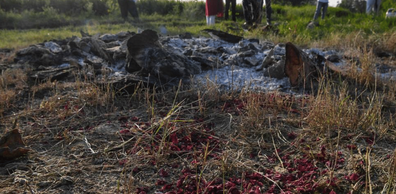 The spot where the 19-year-old woman, who was allegedly gang-raped by four men, was cremated on the outskirts of Bool Garhi village in Hathras in Uttar Pradesh. Credit: AFP Photo