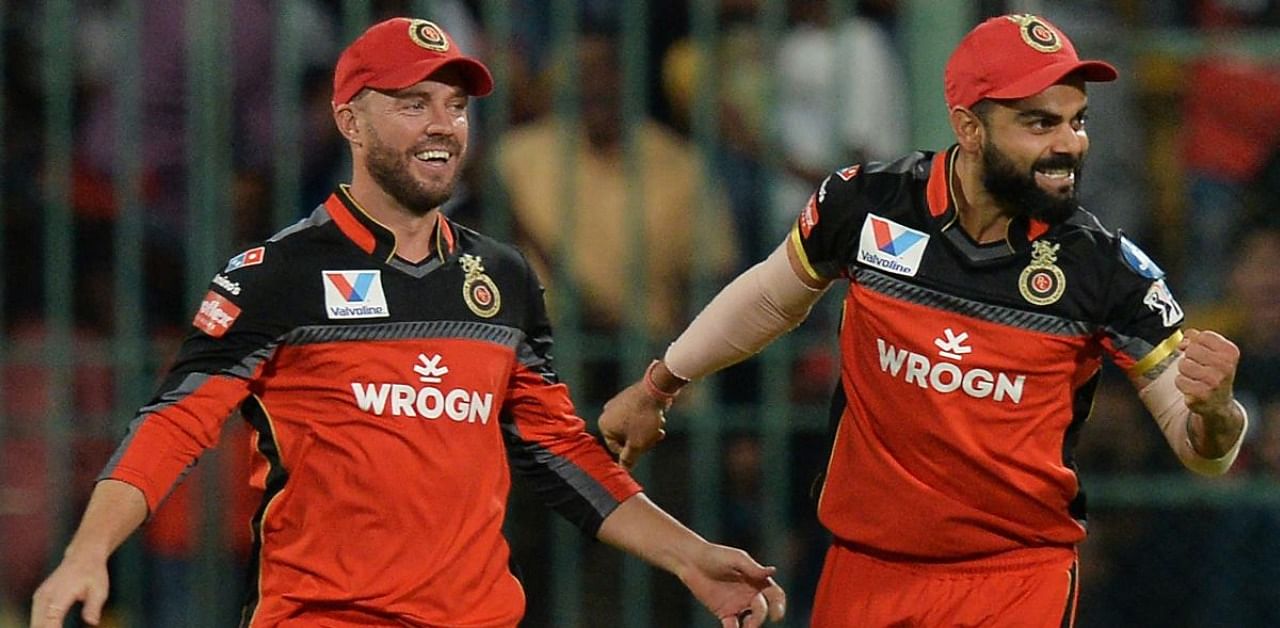The South African veteran (L) changed gears in the last five overs, smashing six sixes and five fours in an unbeaten 73 off 33 balls to set up an 82-run win for Royal Challengers Bangalore. Credit: AFP
