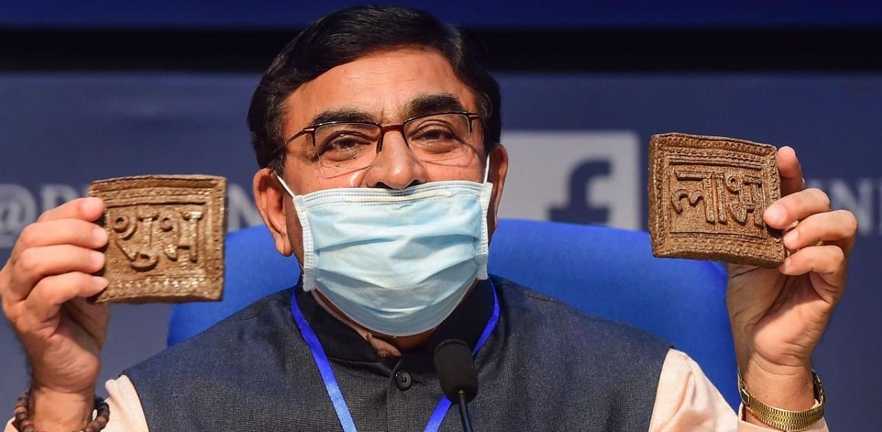 Vallabhbhai Kathiria, Chairman, Rashtriya Kamdhenu Aayog, shows cow- dung based Diwali articles during a news conference Kamdhenu Deepawali campaign, in New Delhi. Credit: PTI