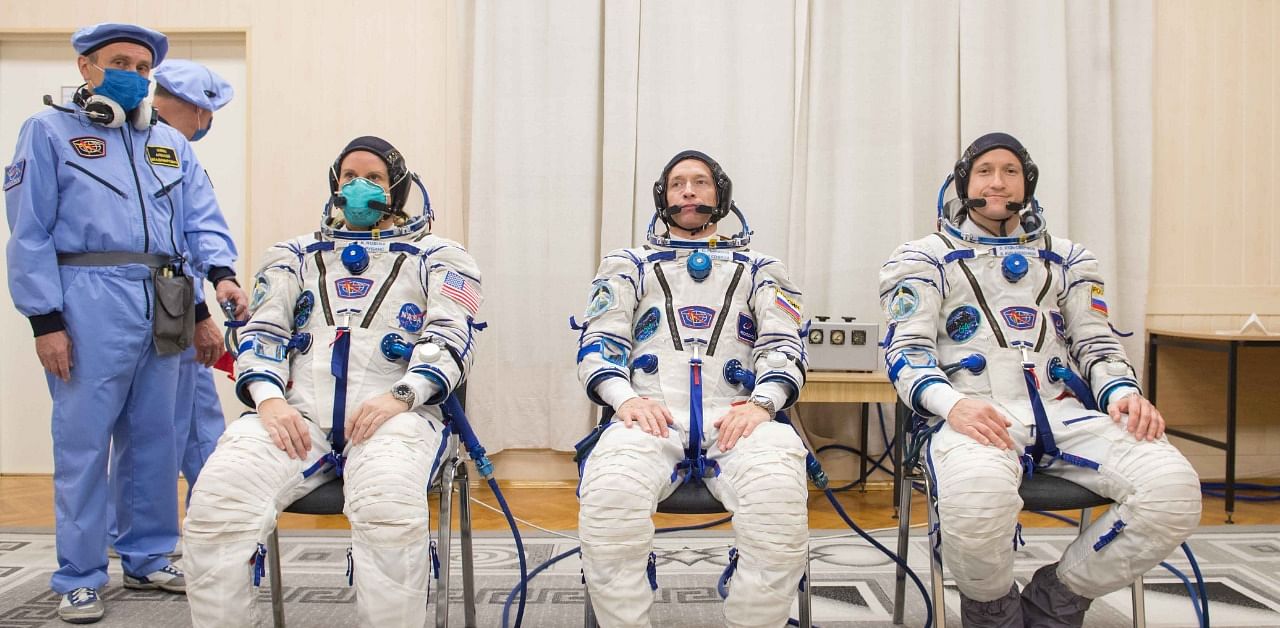 The International Space Station (ISS) crew members Kathleen Rubins of NASA, Sergey Ryzhikov and Sergey Kud-Sverchkov of the Russian space agency Roscosmos. Credit: Reuters Photo