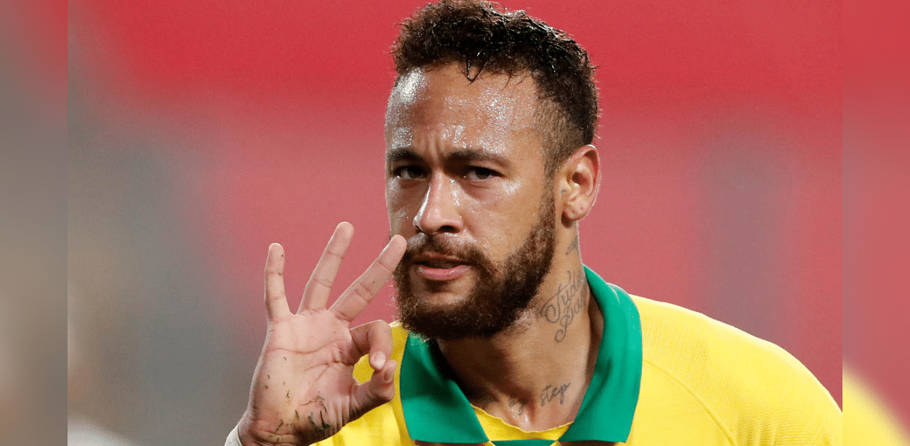  Brazil's Neymar celebrates scoring their fourth goal to complete his hat-trick. Credit: Reuters Photo