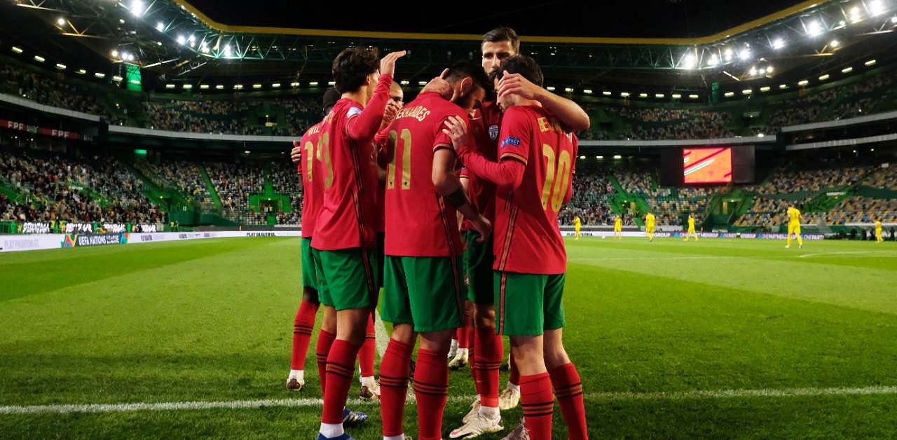 Portugal's Bernardo Silva celebrates scoring their first goal with teammates. Credit: Reuters Photo
