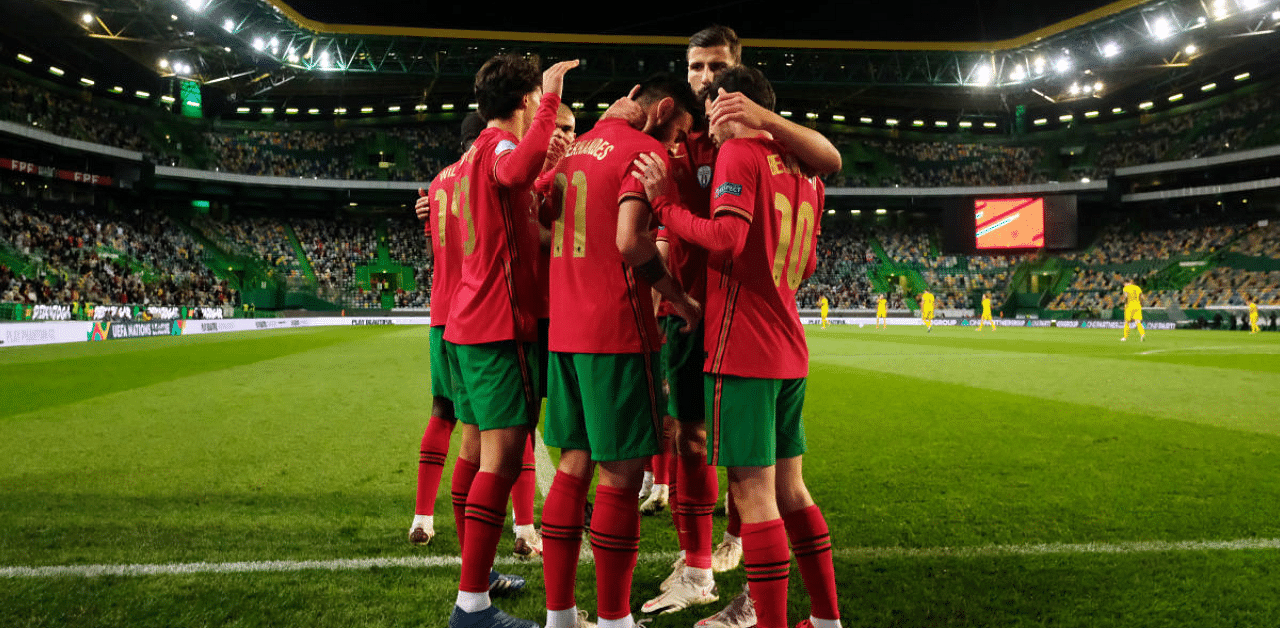 Portugal's Bernardo Silva celebrates scoring their first goal with teammates. Credit: Reuters Photo